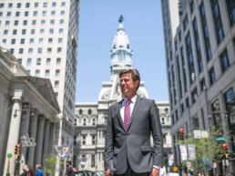 Emmett Madden in front of City Hall Philadelphia